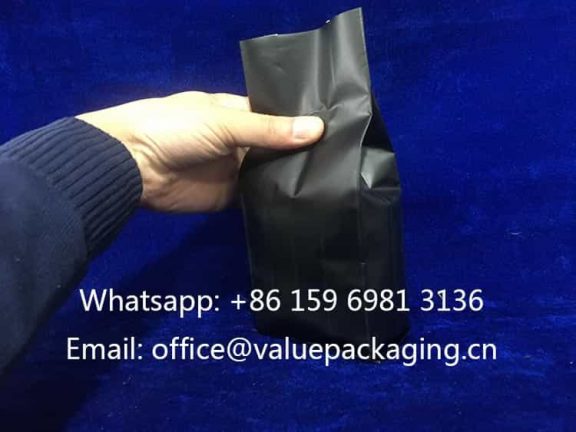 standing-profile-8oz-quad-seal-coffee-bag-matte-black