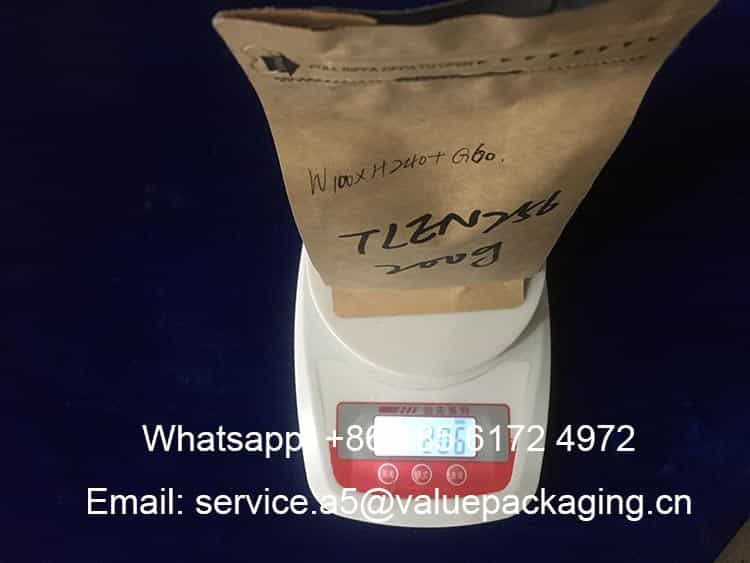 Weighing-200gr-roasted-beans-flat-bottom-coffee-bag-min