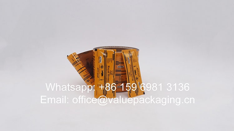 R045-Printed-metallized-film-roll-for-honey-products-15g-3-sides-sealed-sachet