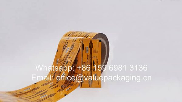 R045-Printed-metallized-film-roll-for-honey-products-15g-3-sides-sealed-sachet