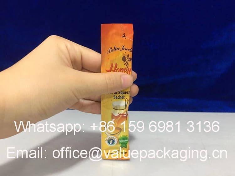 filled-effect-Printed-film-roll-for-honey-10ml-3-sides-sealed-sachet