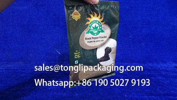 filled-effect-Printed-film-roll-for-black-pepper-powder-50grams-pillow-sachet-W105XH150mmwm